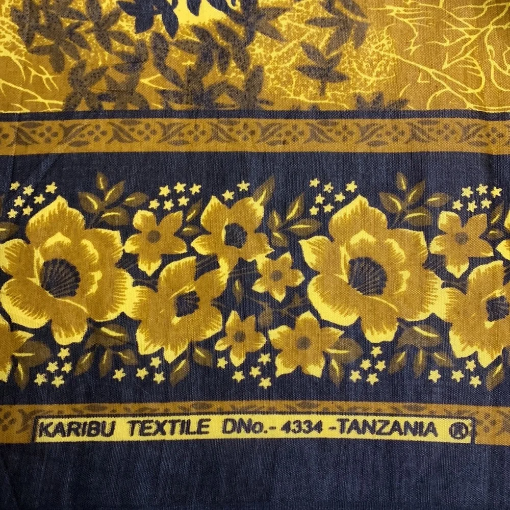 Karibu Textile | East African Wall Hang Tapestry | Orange Yellow Black Floral